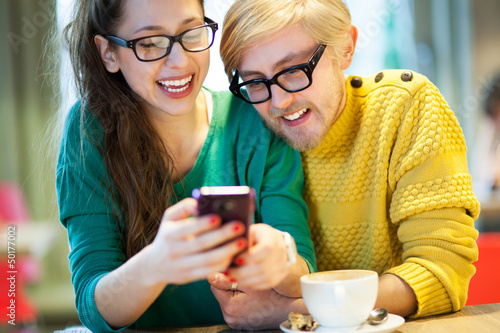 Photo: Students text messaging Students text messaging