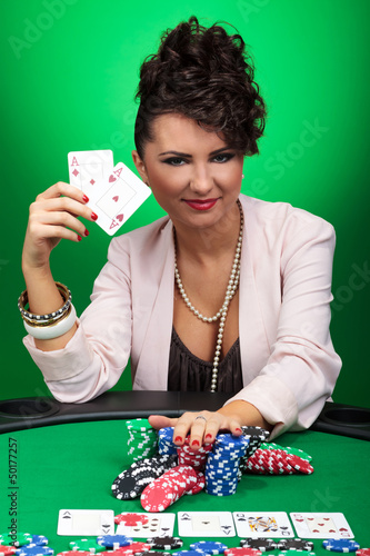 Photo: woman winning at poker woman winning at poker