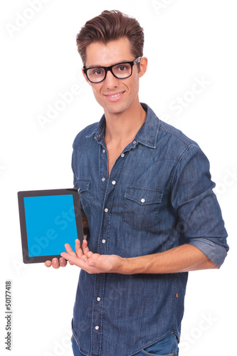 Photo: man presents tablet man presents tablet