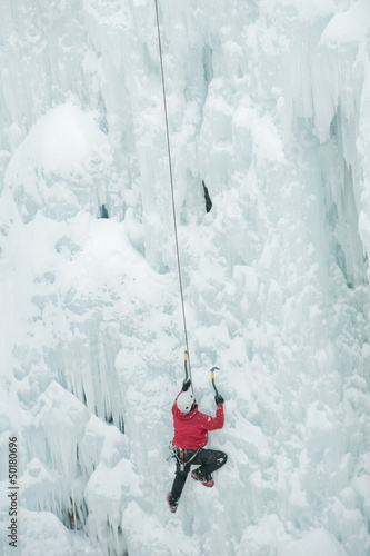 Photo: Caucasian man climbing ice Caucasian man climbing ice
