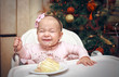 Little girl with a sweet cake in birthday