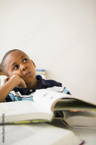 Photo: Black boy studying Black boy studying
