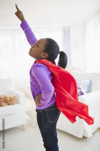 Photo: Black girl pretending to be a superhero Black girl pretending to be a superhero