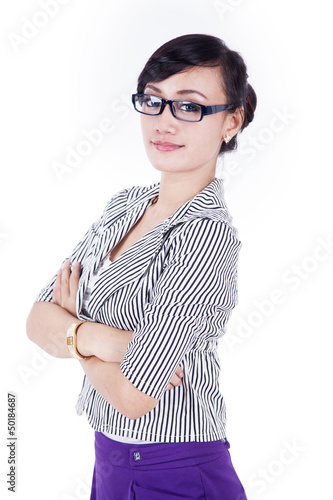 Photo: Attractive businesswoman with arms crossed Attractive businesswoman with arms crossed