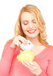 woman with piggy bank and cash money