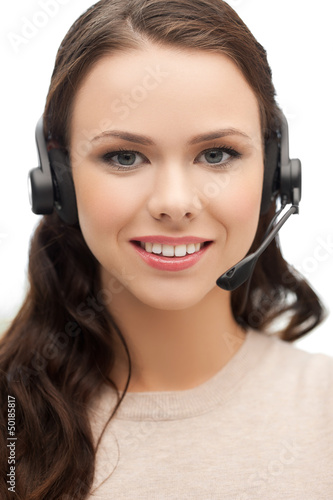 Photo: friendly female helpline operator friendly female helpline operator