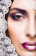portrait of beauty young woman through lace