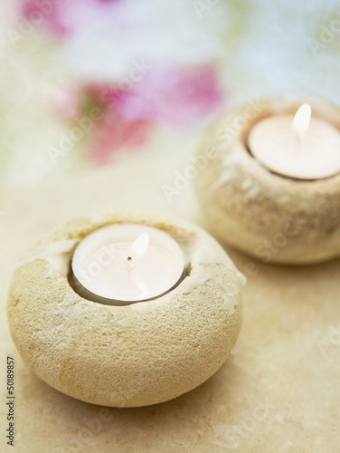 Photo: Votive candles in rock holder Votive candles in rock holder