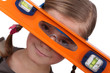 Photo: Girl with a spirit level Girl with a spirit level