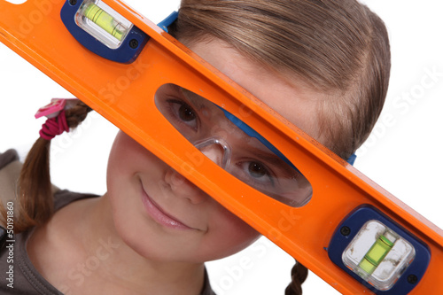 Photo: Girl with a spirit level Girl with a spirit level
