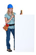 Electrician with a blank board