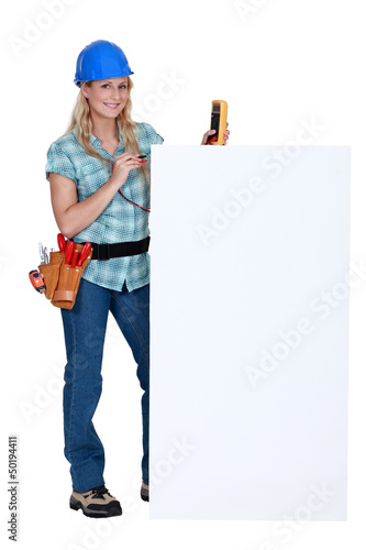 Photo: Electrician with a blank board Electrician with a blank board