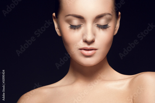 Photo: portrait of beautiful young model, with eyes closed portrait of beautiful young model, with eyes closed