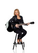 Photo: Sexy guitarist sitting with a black leather jacket Sexy guitarist sitting with a black leather jacket