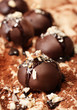 Chocolate candies with nuts, close up