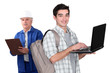 Laborer and student with computers