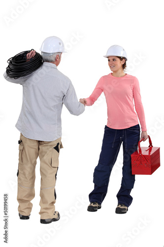 Photo: Partners handshaking Partners handshaking