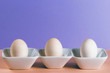 Three duck eggs in a white porcelain dish 2