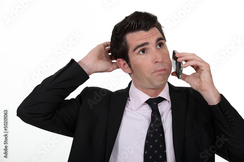 Photo: Man on the phone Man on the phone