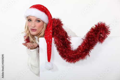 Photo: Woman celebrating Christmas Woman celebrating Christmas