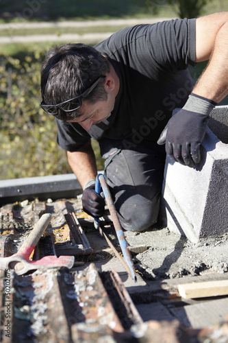 Photo: Roofer hard at work Roofer hard at work