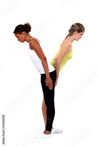 Photo: Women making the letter Y Women making the letter Y