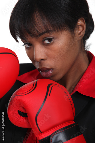 Photo: black woman with boxing gloves black woman with boxing gloves