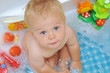 Cute boy bathing
