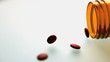 Pill bottle spilling contents