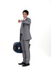 Businessman with suitcase looking at wrist watch