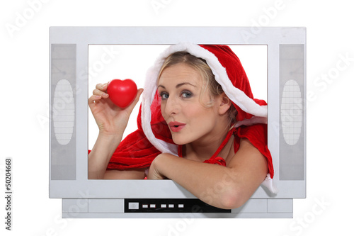 Photo: alluring mother Christmas advertising for TV set alluring mother Christmas advertising for TV set