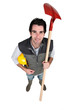 craftsman holding a shovel