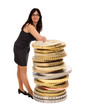 Business woman is based on a stack of money