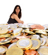 Business woman draws on euro coins