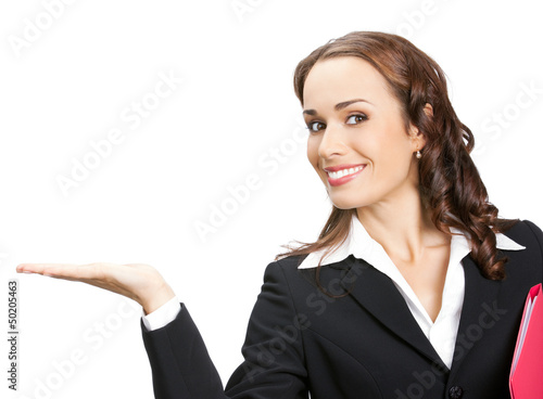 Photo: Businesswoman showing, isolated on white Businesswoman showing, isolated on white