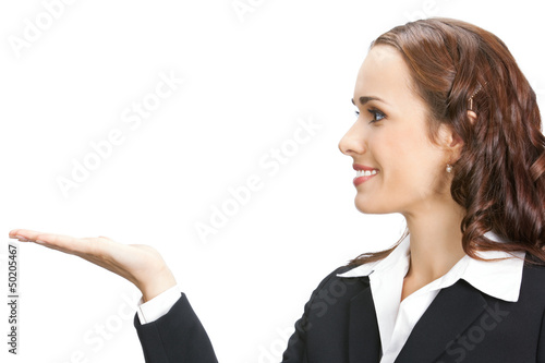 Photo: Businesswoman showing, isolated on white Businesswoman showing, isolated on white