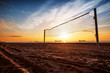 Volleyball net and sunrise on the beach