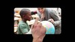 Video: Hand using screens with children at school Hand using screens with children at school