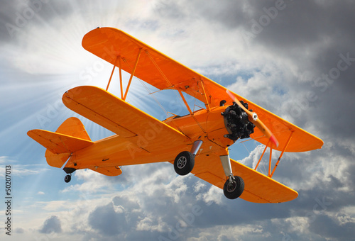 Photo: Old biplane on the sky. Old biplane on the sky.