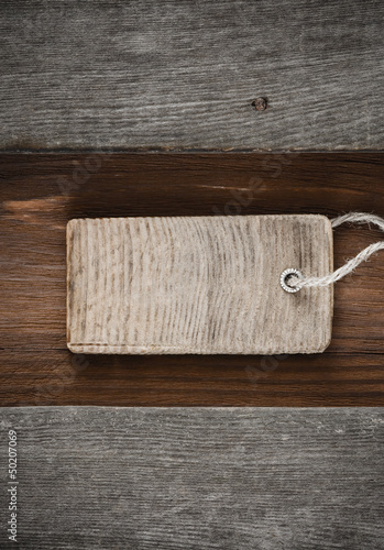 Photo: price tag over wood price tag over wood