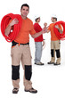 Three male plumbers