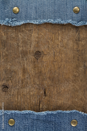 Photo: blue jean on wood texture blue jean on wood texture