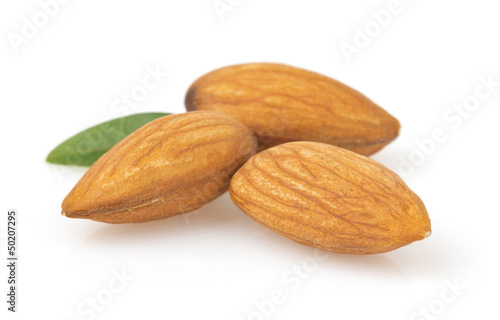 Photo: almond nut on white almond nut on white