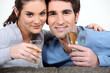 Couple drinking champagne to celebrate anniversary