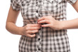 Young beautiful woman buttoning her blouse