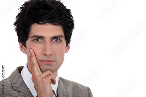 Photo: Portrait of pensive man Portrait of pensive man
