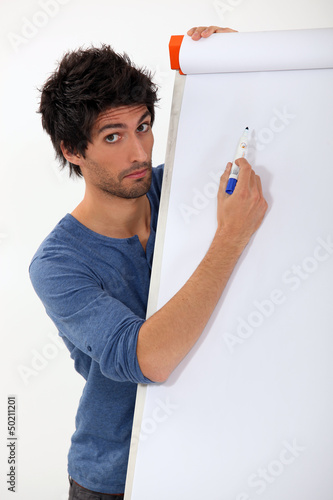 Photo: A casual man doing a presentation. A casual man doing a presentation.