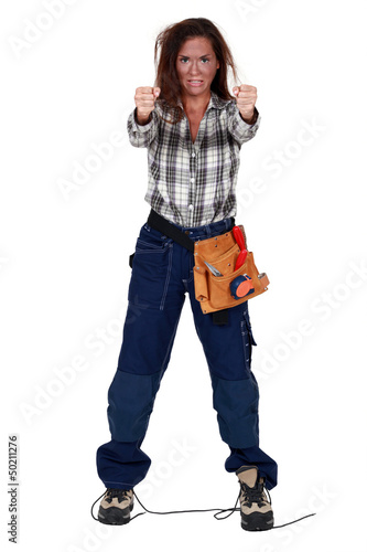 Photo: A burned female construction worker. A burned female construction worker.