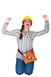 Cheering construction worker