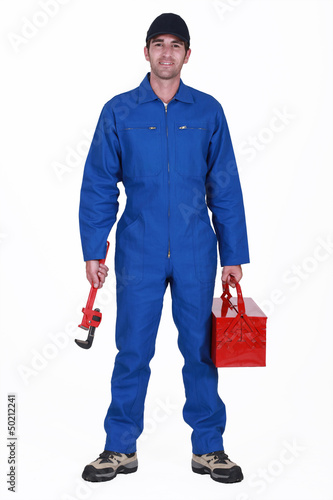 Photo: Plumber arriving at work Plumber arriving at work